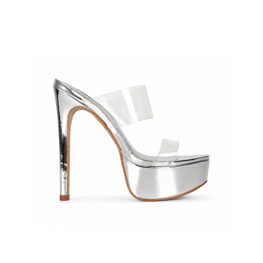 Kaila platform mule in mirrored silver vinyl with clear bands, side view