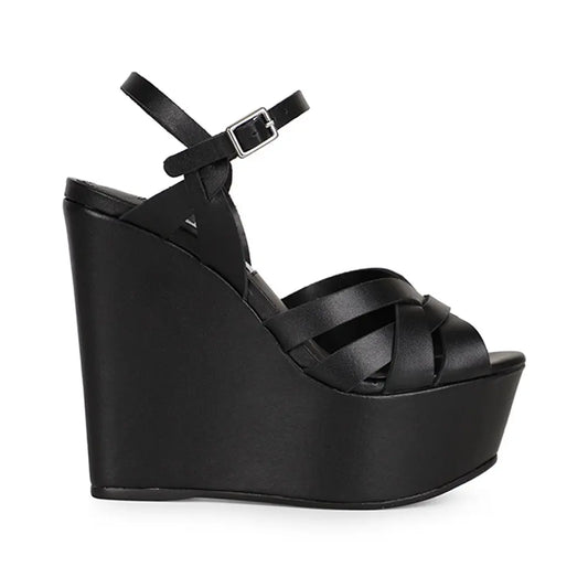 Tainara wedge sandal in black leather, side view