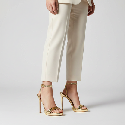 Ananda Platform Sandal Gold Patent Leather worn by a model