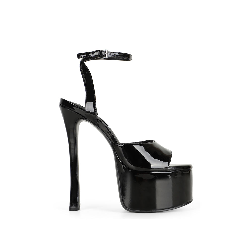 Venus platform sandal in black patent leather with ankle strap, side view