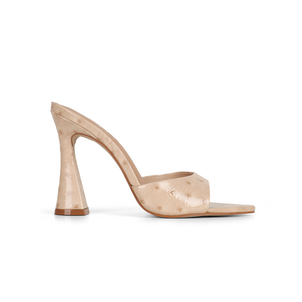 Nola mule in nude leather with sculpted heel, side view