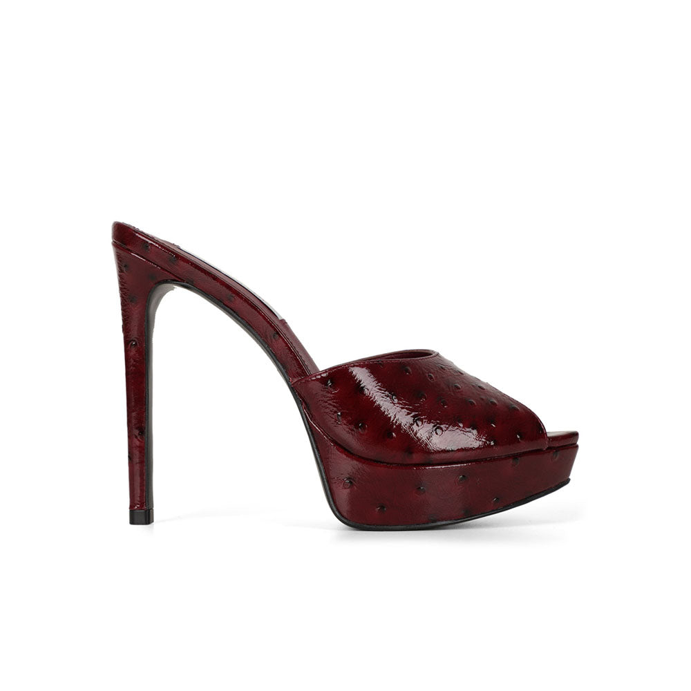 Vega platform sandal in cherry leather, side view